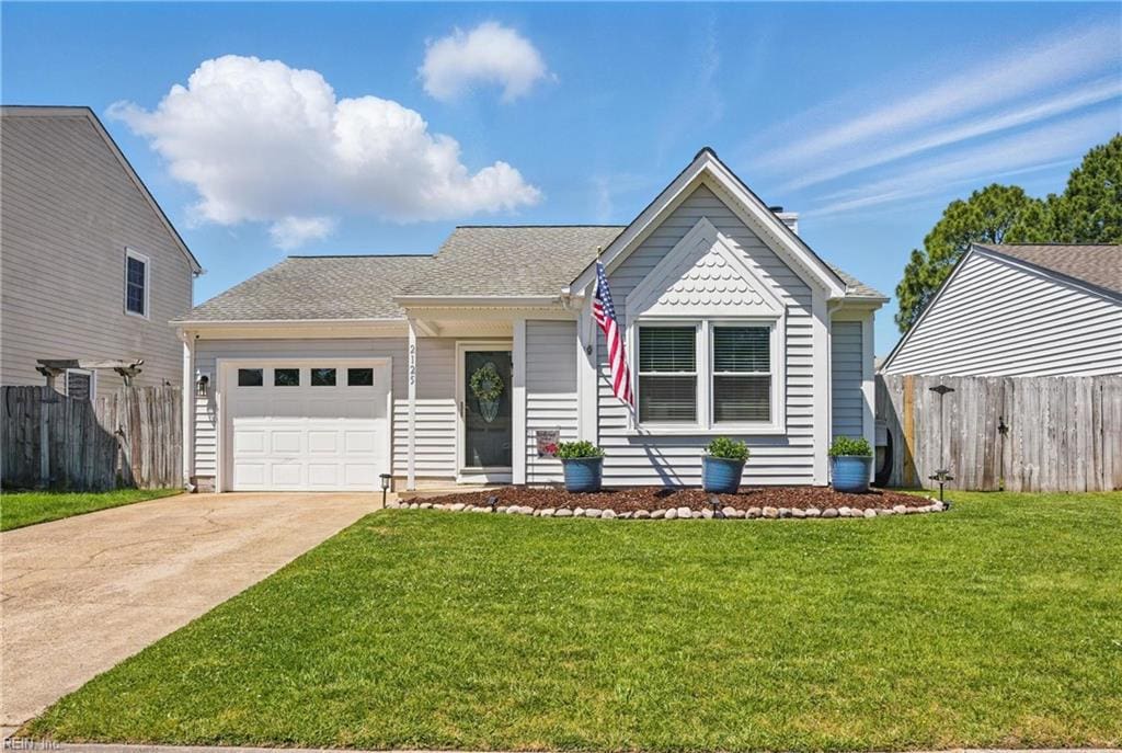 2125 Eagle Rock Rd, Virginia Beach, VA 23456 - view of front of house featuring concrete driveway, an attached garage, fence, and a front yard