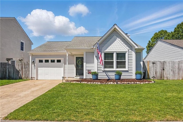 view of front of house featuring concrete driveway, an attached garage, fence, and a front yard