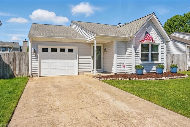 single story home with fence, driveway, a front yard, and a garage