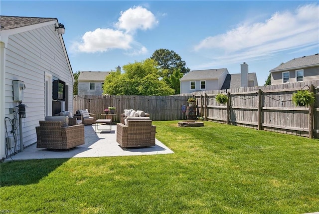 view of yard with a fenced backyard, a patio area, and an outdoor hangout area
