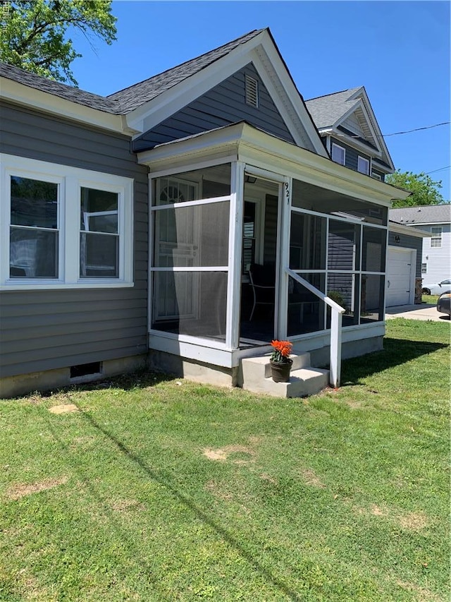 921 Quash St, Hampton, VA 23669 - back of property with a lawn, a shingled roof, and a sunroom