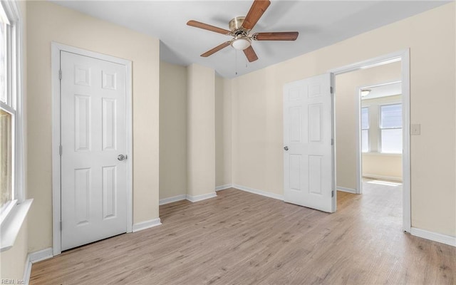 921 Quash St, Hampton, VA 23669 - unfurnished bedroom with baseboards and light wood finished floors