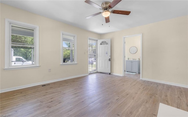 921 Quash St, Hampton, VA 23669 - interior space with visible vents, light wood finished floors, ceiling fan, and baseboards