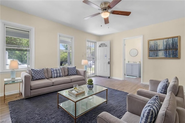 921 Quash St, Hampton, VA 23669 - living room featuring baseboards, ceiling fan, a healthy amount of sunlight, and wood finished floors