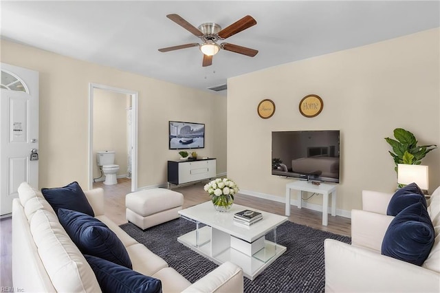 921 Quash St, Hampton, VA 23669 - living area with baseboards, ceiling fan, wood finished floors, and visible vents
