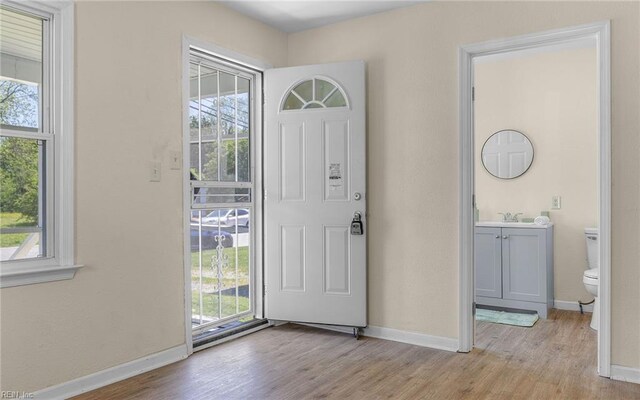 921 Quash St, Hampton, VA 23669 - entryway featuring baseboards and light wood-style flooring