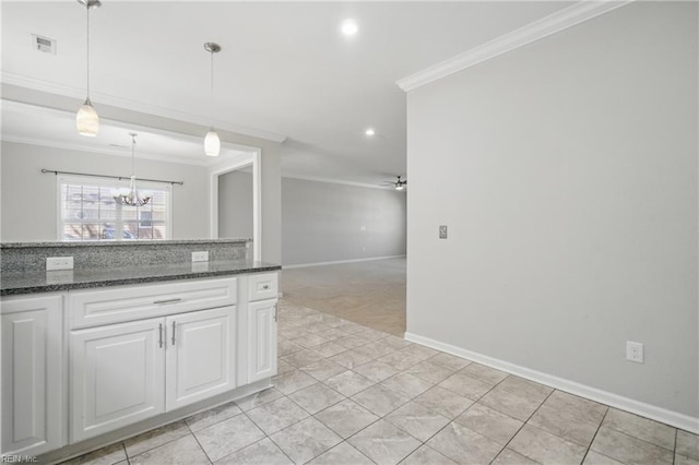 kitchen featuring visible vents, ornamental molding, baseboards, recessed lighting, and white cabinets