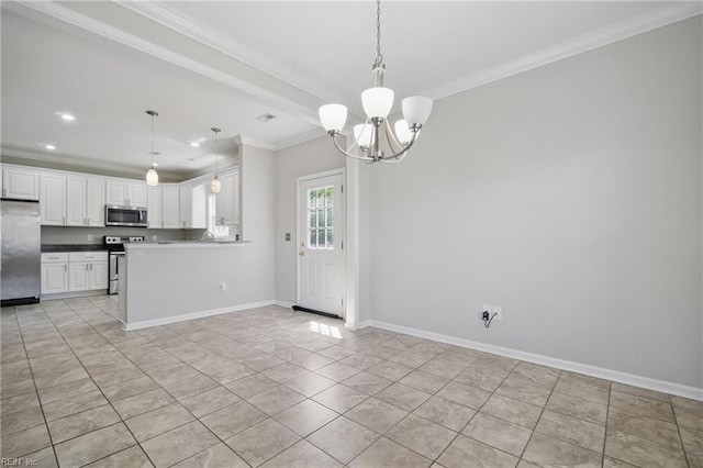 kitchen with ornamental molding, white cabinetry, appliances with stainless steel finishes, a notable chandelier, and hanging light fixtures