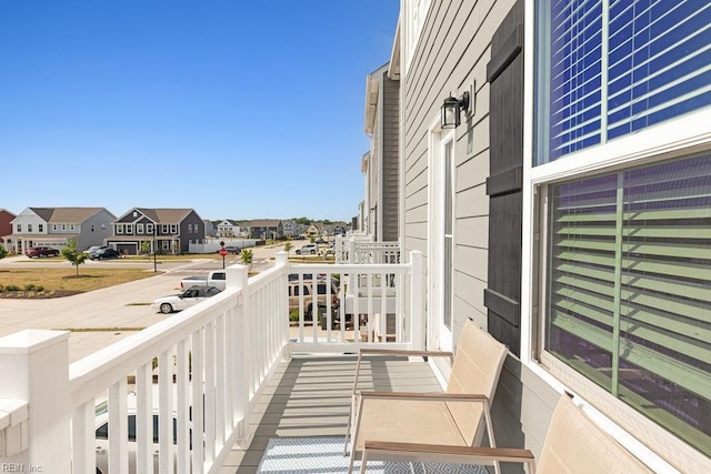 balcony featuring a residential view