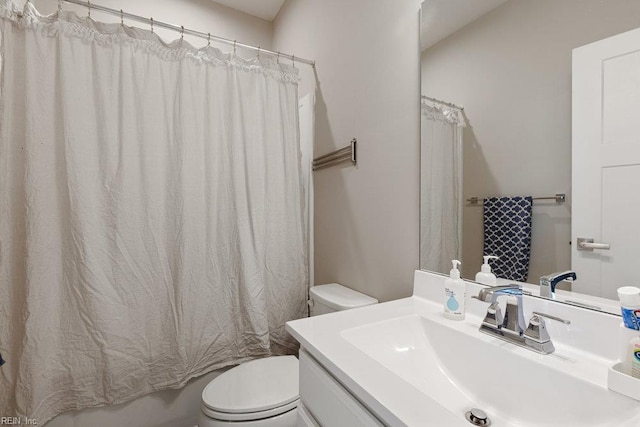 full bath with vanity, toilet, and shower / tub combo