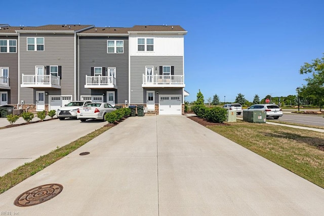 view of front of home featuring a garage and driveway