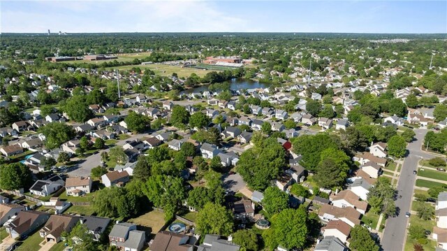 aerial view featuring a water view and a residential view