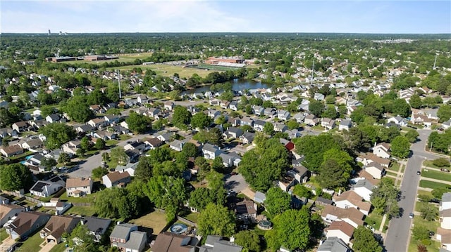 aerial view featuring a water view and a residential view