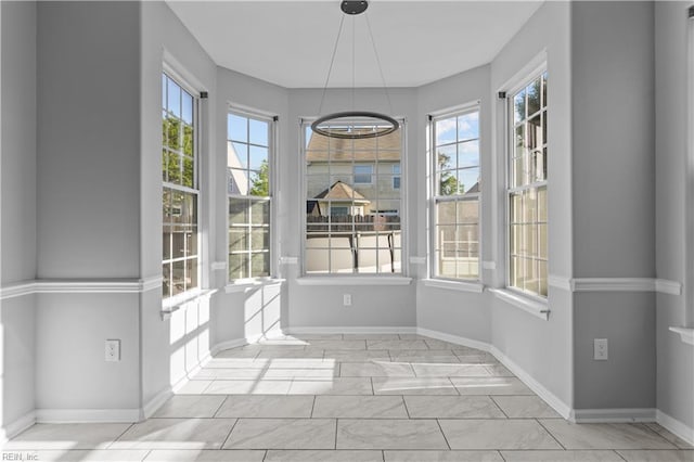 2409 Apiary Ct, Virginia Beach, VA 23454 - unfurnished dining area with healthy amount of natural light and baseboards