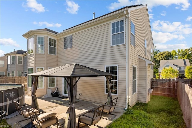 2409 Apiary Ct, Virginia Beach, VA 23454 - back of property featuring a gazebo, a fenced backyard, and a patio