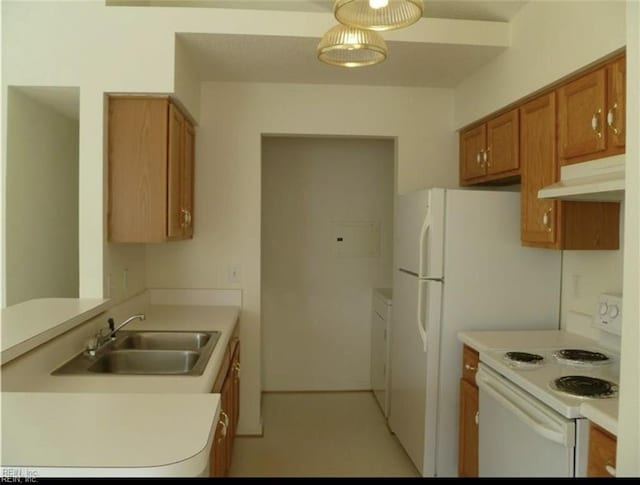 kitchen featuring brown cabinets, white range with electric stovetop, a sink, light countertops, and under cabinet range hood