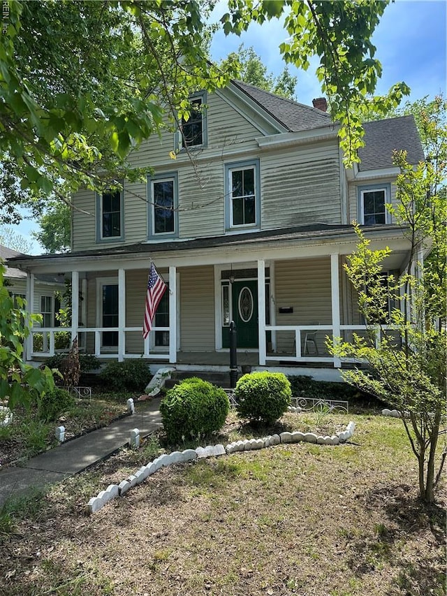 farmhouse-style home with a porch