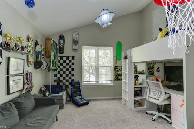 carpeted bedroom featuring baseboards and vaulted ceiling