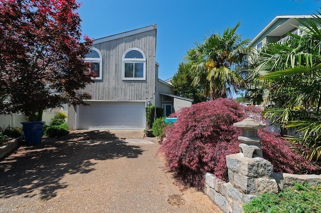 12 Rudee Ave, Virginia Beach, VA 23451 - view of front of house with dirt driveway and an attached garage