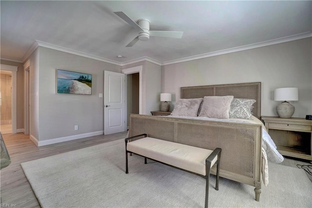 bedroom with baseboards, ceiling fan, ornamental molding, and wood finished floors