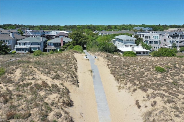 birds eye view of property with a residential view