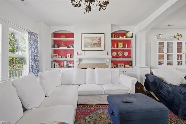 422 New London Pl, Virginia Beach, VA 23454 - living area featuring an inviting chandelier, built in shelves, and visible vents