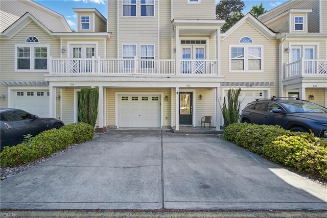 422 New London Pl, Virginia Beach, VA 23454 - townhome / multi-family property featuring driveway and a garage
