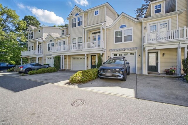 422 New London Pl, Virginia Beach, VA 23454 - townhome / multi-family property featuring an attached garage and driveway