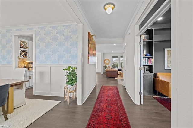 hallway with crown molding and dark wood-style floors