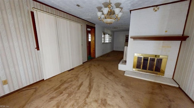 3702 Nansemond Pkwy, Suffolk, VA 23435 - unfurnished living room featuring wallpapered walls, carpet, a fireplace, and a chandelier