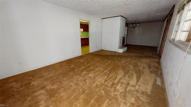 3702 Nansemond Pkwy, Suffolk, VA 23435 - carpeted empty room featuring a chandelier and a textured ceiling