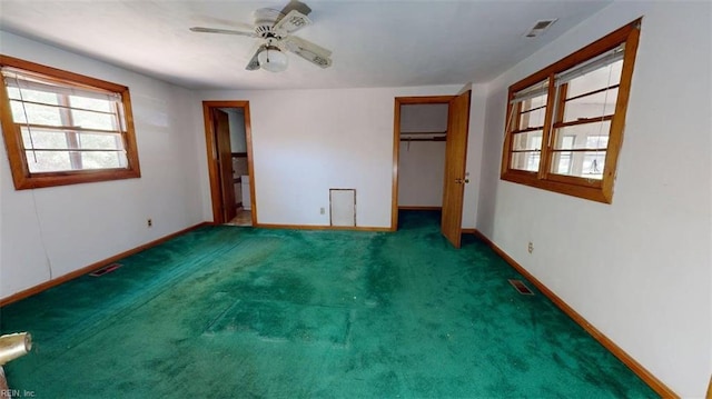 3702 Nansemond Pkwy, Suffolk, VA 23435 - unfurnished bedroom featuring baseboards, carpet, a ceiling fan, a walk in closet, and a closet