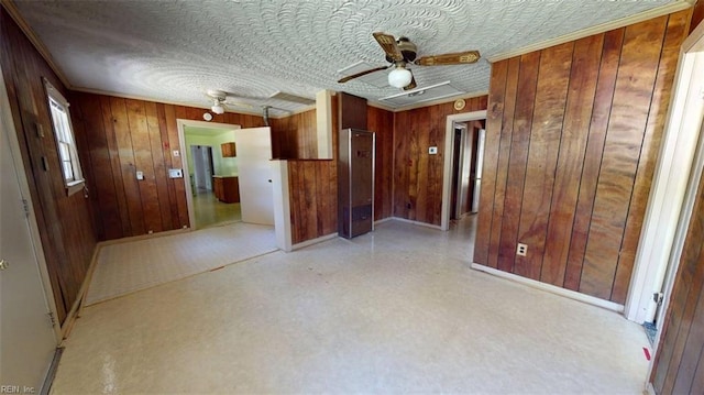 3702 Nansemond Pkwy, Suffolk, VA 23435 - unfurnished room with wooden walls, ceiling fan, attic access, and baseboards