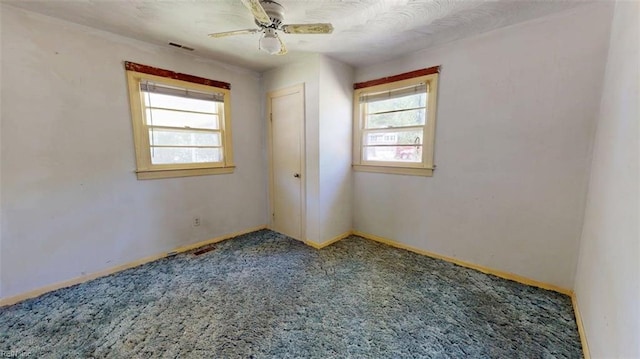 3702 Nansemond Pkwy, Suffolk, VA 23435 - unfurnished room featuring healthy amount of natural light, carpet floors, and ceiling fan