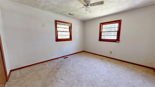 3702 Nansemond Pkwy, Suffolk, VA 23435 - carpeted empty room featuring healthy amount of natural light, baseboards, and a ceiling fan