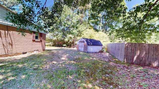 3702 Nansemond Pkwy, Suffolk, VA 23435 - view of yard with fence, a storage unit, and an outdoor structure