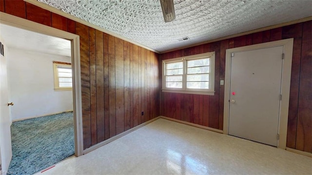 3702 Nansemond Pkwy, Suffolk, VA 23435 - unfurnished room featuring wooden walls and baseboards