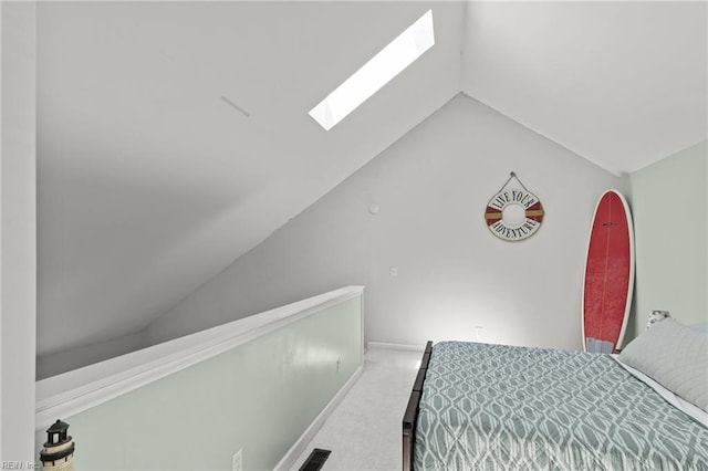 403 Harbour Pt Unit 305, Virginia Beach, VA 23451 - unfurnished bedroom featuring carpet floors, baseboards, visible vents, and lofted ceiling with skylight