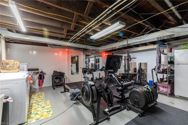 exercise area with independent washer and dryer