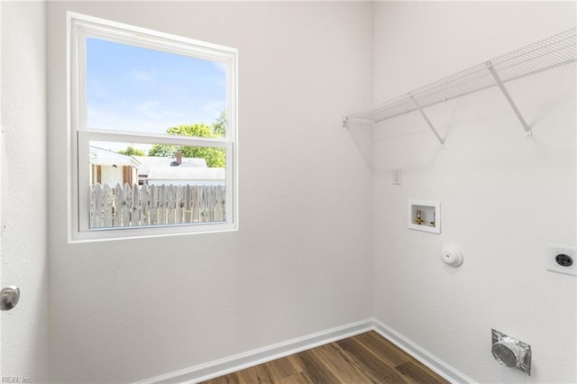laundry area with laundry area, washer hookup, baseboards, dark wood-type flooring, and hookup for an electric dryer