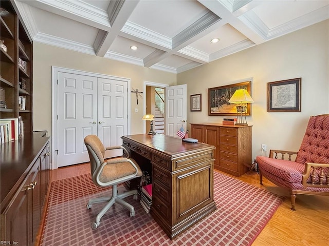 office space with crown molding, beam ceiling, wood finished floors, coffered ceiling, and recessed lighting