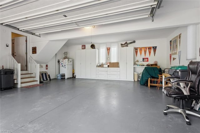 garage featuring freestanding refrigerator