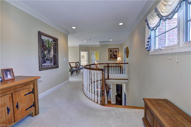 hall with ornamental molding, light carpet, baseboards, recessed lighting, and an upstairs landing