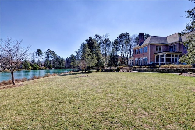 view of yard featuring a water view