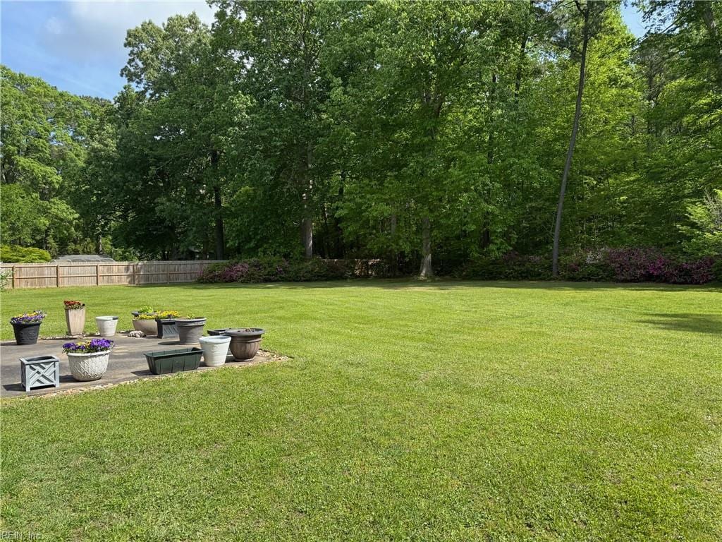 view of yard with fence