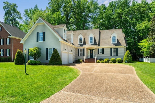 20639 Creekside Dr, Smithfield, VA 23430 - view of front facade with fence, an attached garage, driveway, and a front yard