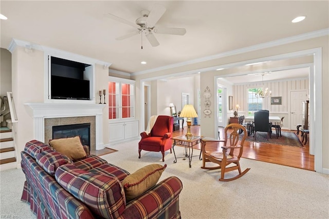 20639 Creekside Dr, Smithfield, VA 23430 - carpeted living area featuring crown molding, recessed lighting, ceiling fan, and a fireplace with flush hearth