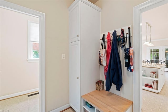 20639 Creekside Dr, Smithfield, VA 23430 - mudroom with light tile patterned flooring, baseboards, visible vents, and a healthy amount of sunlight