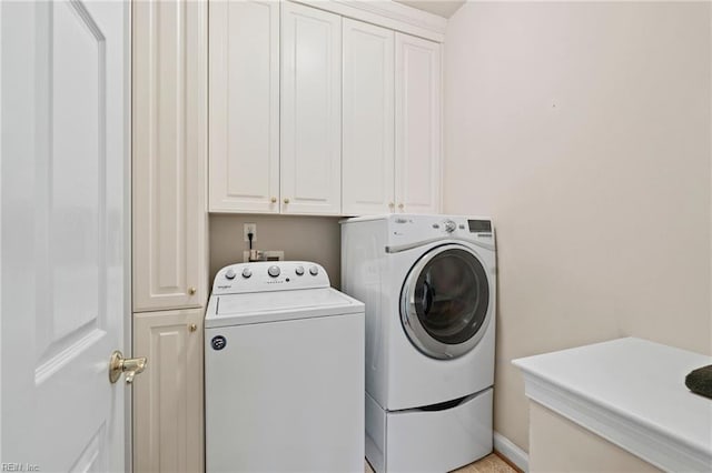 20639 Creekside Dr, Smithfield, VA 23430 - laundry area with cabinet space and washer and clothes dryer