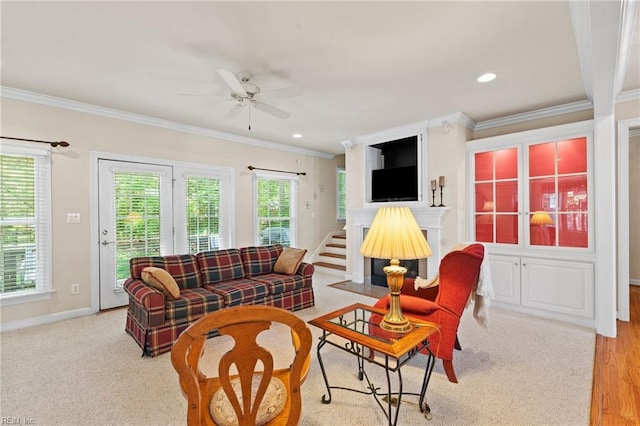 20639 Creekside Dr, Smithfield, VA 23430 - living room with baseboards, ornamental molding, light carpet, and ceiling fan